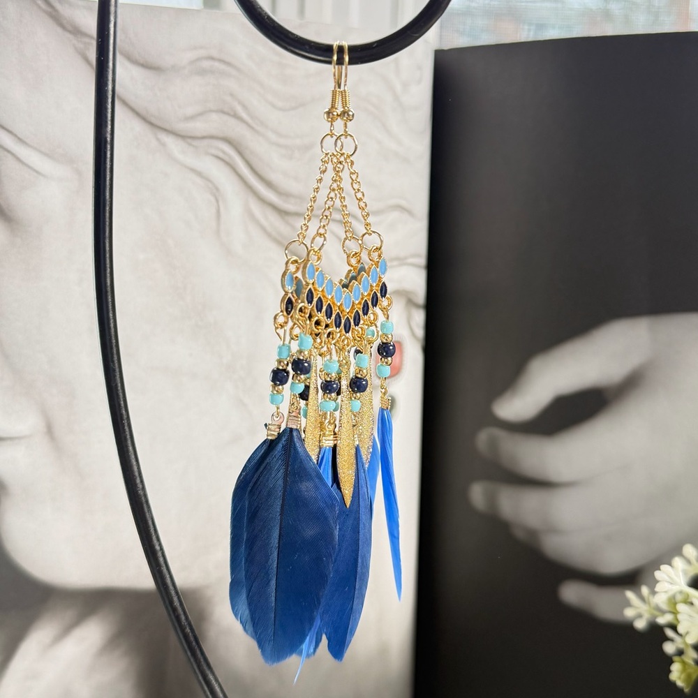 Gold Earring with Feather